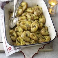 Squashed baby potatoes with rosemary image