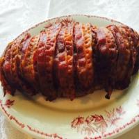 Boudin Stuffed Pork Tenderloin Wrapped in Bacon image