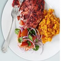 Tandoori tilapia with spicy sweet potato mash & tomato salad image