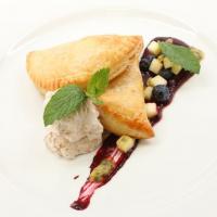 White Chocolate Passion Fruit Turnovers with Blueberry-Mint Sauce and Coconut Cream_image