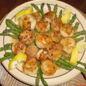 Scallops on Asparagus Spears with Wine Reduction image