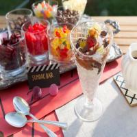 Movie Theater Candy Sundae Bar with Hot Fudge and Caramel Sauces_image