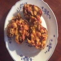 Potato Skins Filled With Ham, Baked Beans and Cheese image
