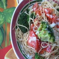 Pasta With Tomatoes, Broccoli and Cheese image
