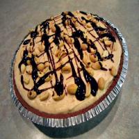 Frozen Peanut Butter Cheesecake With Fudge Sauce Topping_image