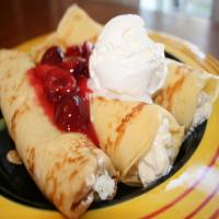 Cream Filled Crepes With Tart Cherry Sauce image