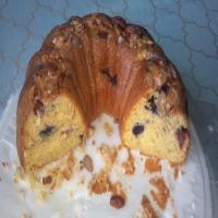Lemon Pudding Cake W Mixed Berries and Powdered Sugar Glaze image