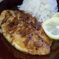 Sauted Fish Fillets With Sliced Garlic and Butter Sauce_image