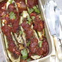 Baked courgettes stuffed with spiced lamb & tomato sauce image