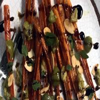 Easy, Maple Roasted Carrots With Olives + Almonds + Mint Recipe by Tasty image