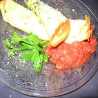 Herbed Crepes With Ricotta, Green Peppers and Tomato Sauce image