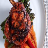 Grilled Cajun Pork Chops With Peach Bourbon Sauce Recipe by Tasty image