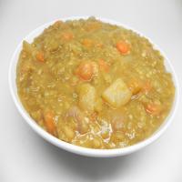 Split Pea Soup with Homemade Ham Bone Stock_image