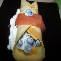 Crepes With Blueberry Stuffing and Rhubarb Compote image