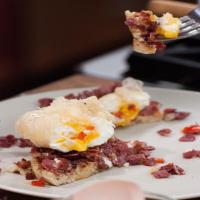 Crisp Tempura Poached Egg over English Muffin with Red Pepper Corned Beef Hash image