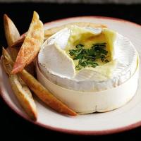 Baked cheese with herbs image