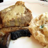 Pepper Steak With Butter Bean Mash and Portabella Mushrooms. image
