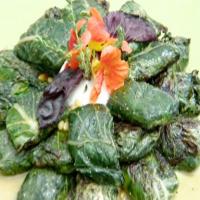Grilled Bacara Ranch Romaine Leaves with Prosciutto, Pine Nuts and Basil image