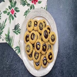 Pistachio-Orange Thumbprint Cookies With Chocolate Ganache Recipe by Tasty_image