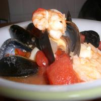 Seafood Trio With Fire Roasted Tomato Garlic Sauce image