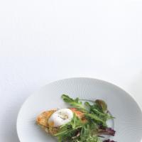 Savory Parmesan Pain Perdu with Poached Eggs and Greens image
