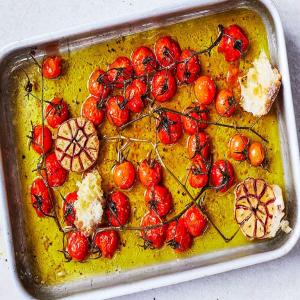 Slow-cooked vine tomatoes with garlic image