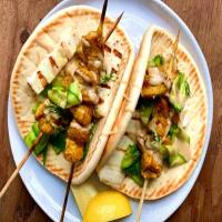 Grilled Chicken Kebabs with Pita, Halloumi and Shaved Cucumber Salad image