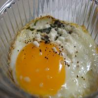 Baked Eggs With Fresh Herbs and Goat Cheese image