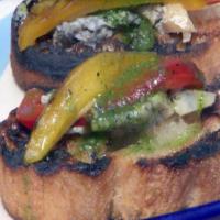 Grilled Bruschetta with Grilled Red and Yellow Peppers, Gorgonzola and Basil Oil image