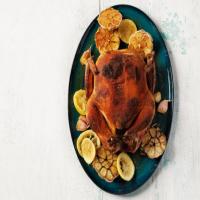 Whole Spice-Rubbed Chicken with Roasted Garlic and Lemons image