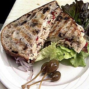 Tuna and Artichoke Salad on Kalamata Olive Bread with Provolone Cheese and Fresh Herb and Garlic Aioli_image