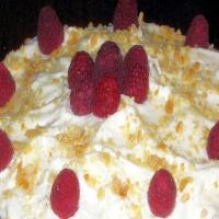 Raspberry Filled Cake With White Chocolate and Macadamias image