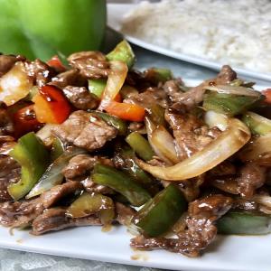 Pepper Steak is a tasty asian style dish served on a bed of white rice!_image