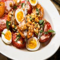 Charred Tomatoes With Egg, Anchovies and Bread Crumbs image