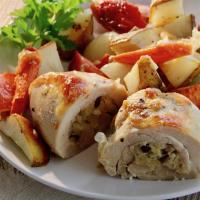 Stuffed Chicken Thighs with Roasted Potatoes and Carrots image