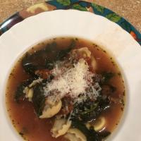 Garlicky Tortellini Soup With Sausage, Tomatoes, and Spinach image