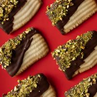 Chocolate-Dipped Spritz Washboards with Pistachios image