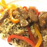 Venison Steak with Peppers and Onions image