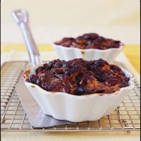 Individual Croissant Bread Puddings with Dried Cherries, Bittersweet Chocolate, and Toasted Pecans_image