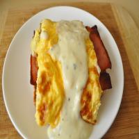 Brunch Eggs With Herbed Cheese Sauce image