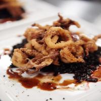 Fried Calamari with Pink Lemonade Chili and Tamarind Reduction over Sesame Black Rice_image