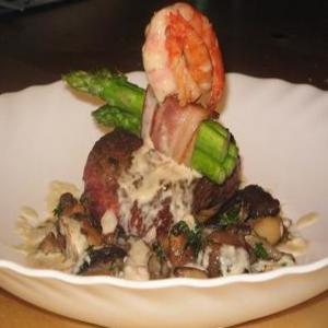 Ostrich Steaks With Prawns and a Roasted Garlic Sauce image