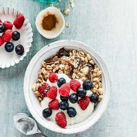 Homemade muesli with oats, dates & berries image