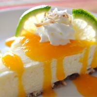 Coconut-Lime Cheesecake with Mango Coulis image