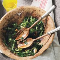 Arugula Salad with Caramelized Onions, Goat Cheese, and Candied Walnuts image