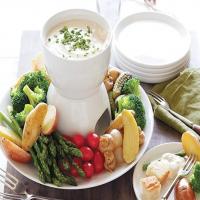 Easy Cheesy Fondue with Fingerling Potatoes, French Bread and Select Vegetables image
