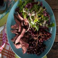 Broiled Flank Steak with Grilled Champagne Grapes and a Bitter Greens and Blue Cheese Salad_image