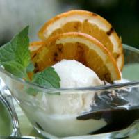 Grilled Orange Slices with Frozen Yogurt and Raspberry-Fudge Sauce image