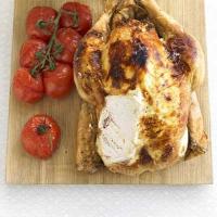 Herby cheese roast chicken & baked tomatoes image