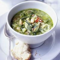 Spring vegetable soup with basil pesto image